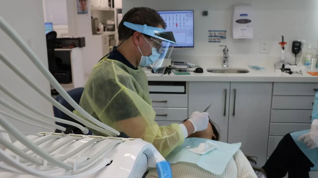 Dental bonding is used to improve a patient’s smile.