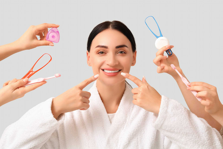 a photo of a lady maintaining good oral hygeine to prevent tooth abscess